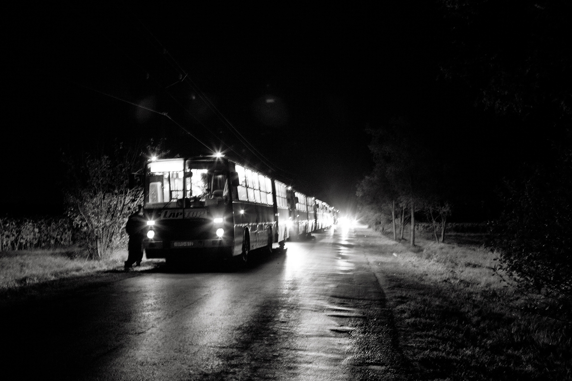 14 September 2015, Röszke, Hungary.
Busses carrying refugees arrived in Hungary from Serbia on the 14-09-2015 wait for a train to - assumingly - take them to the Austrian border. Many people had to stay in the busses for over 4 hours. Hungarian authorities have put fences on the common border with Serbia in to reestablish control on the migration movement since a tightening law passed by the right-wing Hungarian government takes effect this midnight.